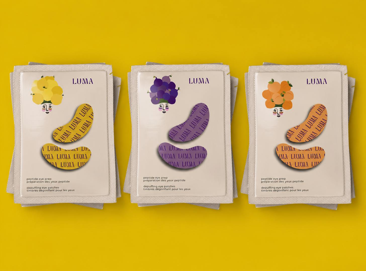 LUMA under eye mask packaging in yellow, purple, and orange variants